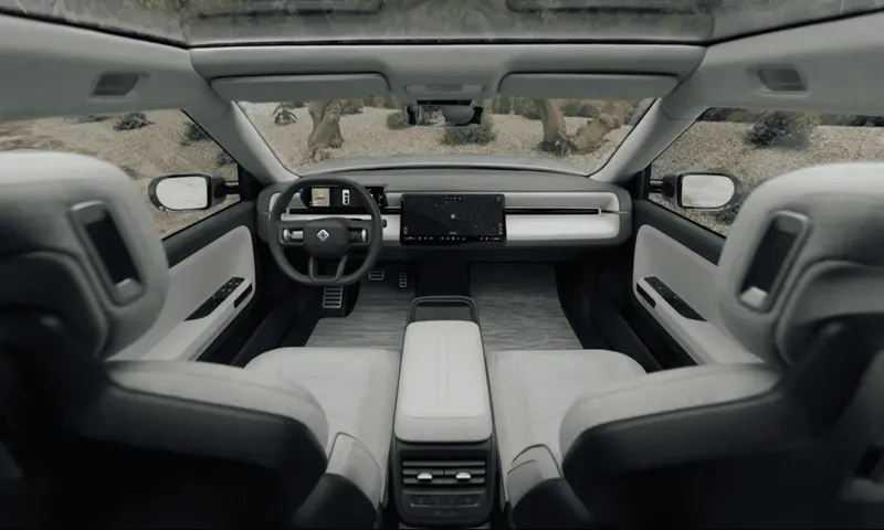 Uber and Rivian Partner to Deploy 50,000 Fully Autonomous Robotaxis